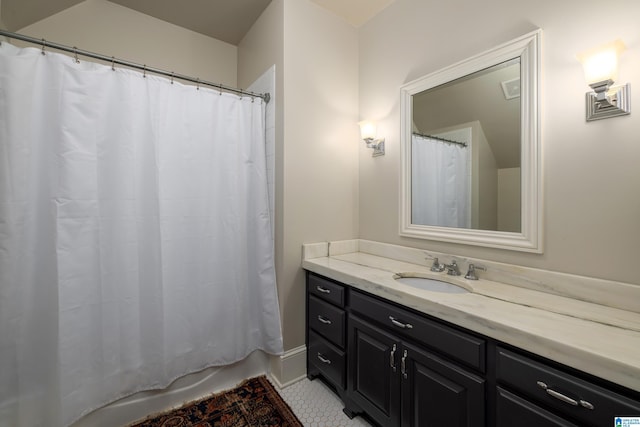 full bath with vanity, tile patterned floors, shower / bath combo, and visible vents