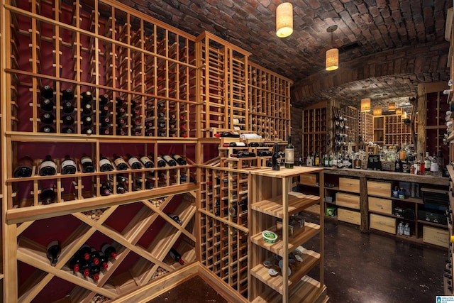 wine room featuring brick ceiling