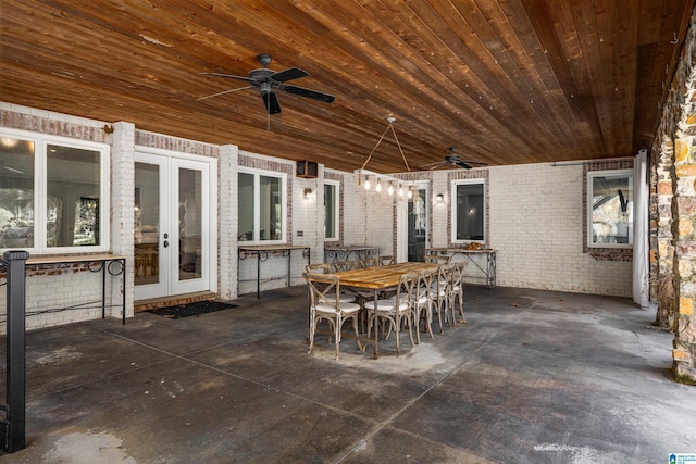 view of patio / terrace featuring outdoor dining area, french doors, and ceiling fan