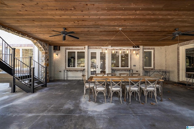 view of patio with outdoor dining space and ceiling fan