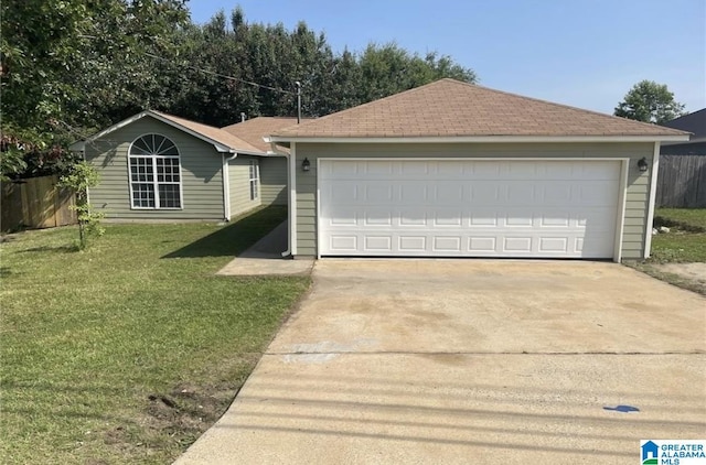 ranch-style house with a front lawn, fence, a detached garage, and a shingled roof