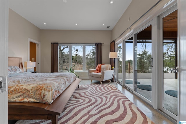 bedroom featuring access to exterior, recessed lighting, visible vents, and concrete floors