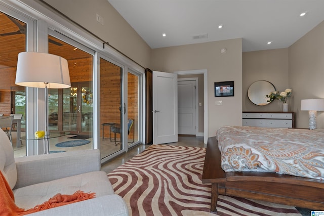 bedroom with recessed lighting, visible vents, and access to exterior