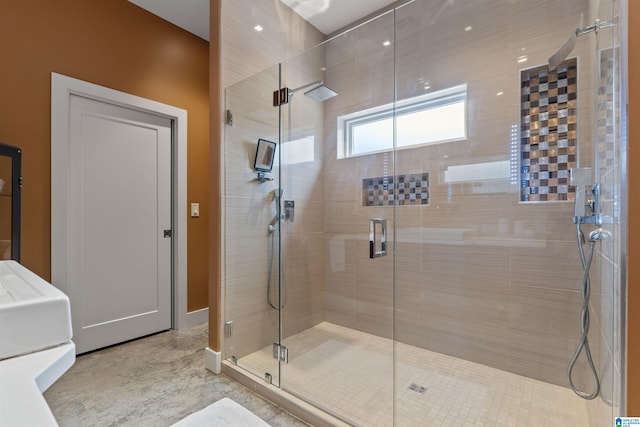 full bathroom featuring a shower stall