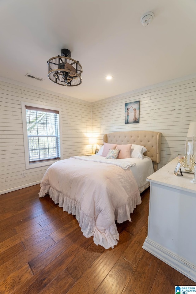 bedroom featuring recessed lighting, visible vents, and dark wood-style flooring