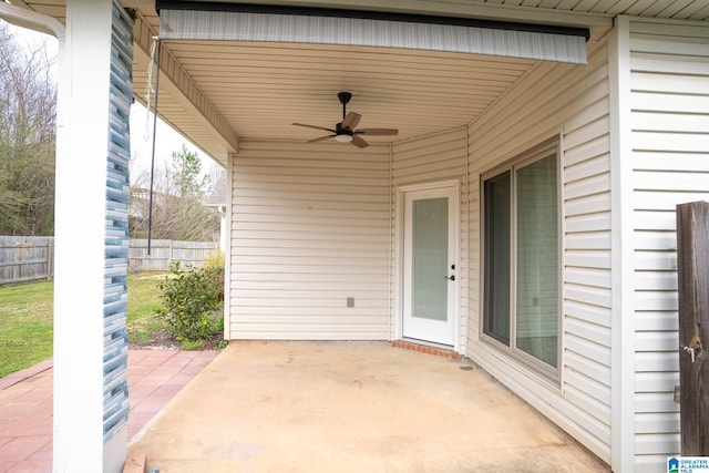 view of patio / terrace featuring a ceiling fan and fence