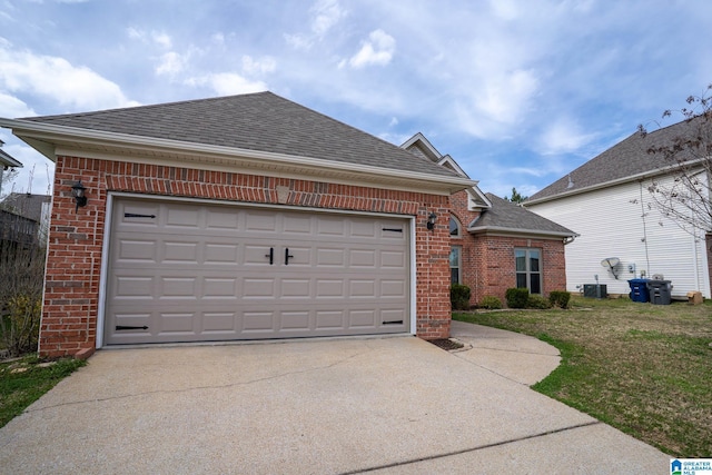 view of front of home featuring brick siding, driveway, and roof with shingles