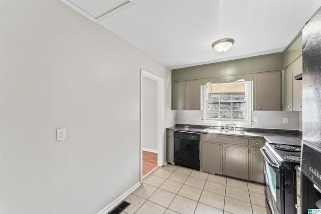 kitchen with electric range, gray cabinetry, a sink, light tile patterned flooring, and dishwasher