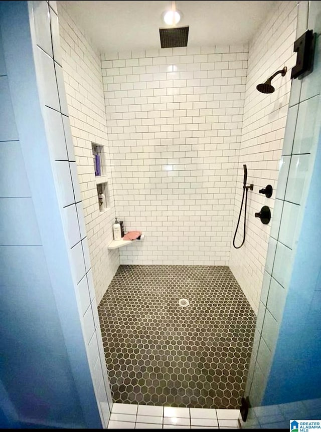 full bath featuring a stall shower