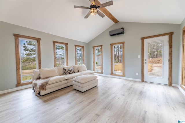 living room with a healthy amount of sunlight, lofted ceiling with beams, and light wood-type flooring