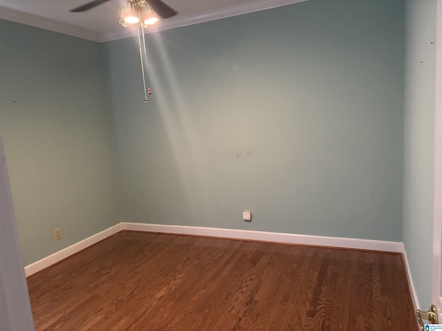 unfurnished room featuring ceiling fan, baseboards, and wood finished floors