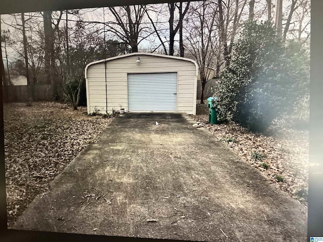 detached garage with fence