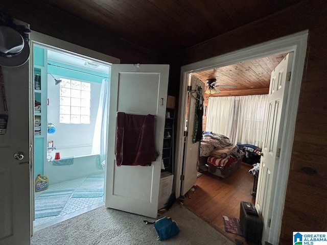 interior space with wood ceiling and wood finished floors