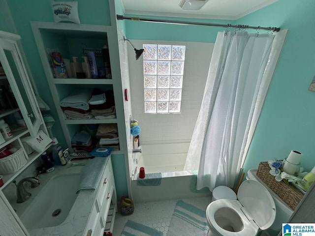 bathroom with vanity, shower / tub combo, and toilet