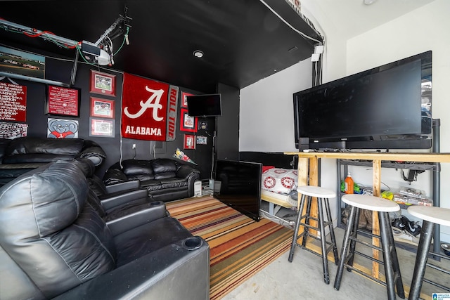 living area featuring concrete flooring