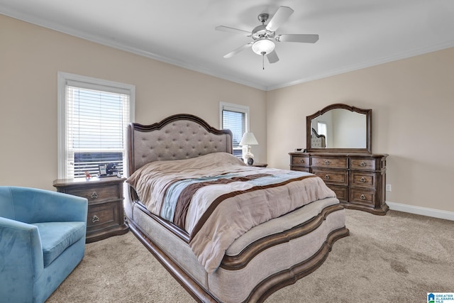 bedroom featuring ceiling fan, baseboards, carpet floors, and ornamental molding