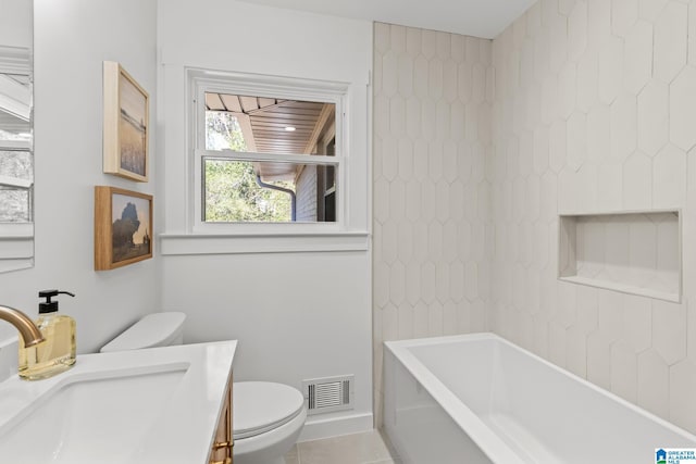 full bathroom with visible vents, toilet, a washtub, tile patterned flooring, and vanity