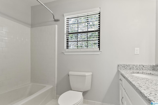 bathroom featuring tile patterned flooring, baseboards, toilet, shower / tub combination, and vanity