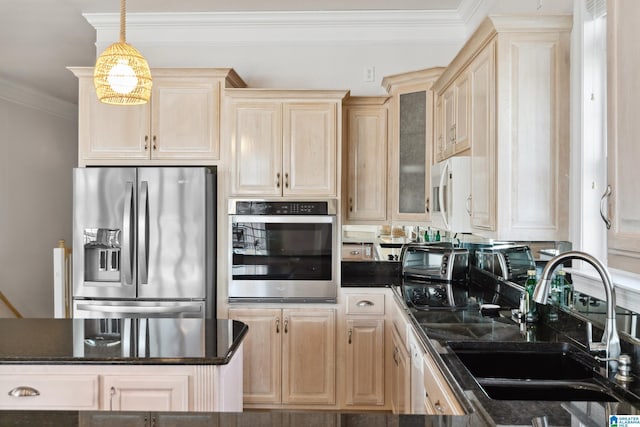 kitchen with light brown cabinets, glass insert cabinets, ornamental molding, stainless steel appliances, and a sink