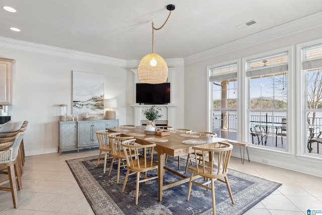 dining area featuring baseboards, visible vents, light tile patterned flooring, recessed lighting, and ornamental molding