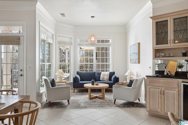 89 Hall Cir, Shelby, AL 35143 - living room featuring light tile patterned floors, ornamental molding, wine cooler, and visible vents