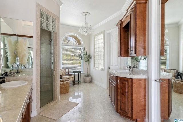 bathroom featuring crown molding, two vanities, a stall shower, and a sink