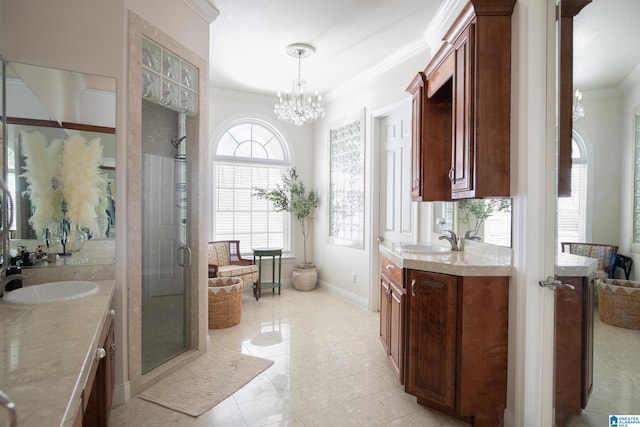 full bath featuring two vanities, a stall shower, crown molding, and a sink