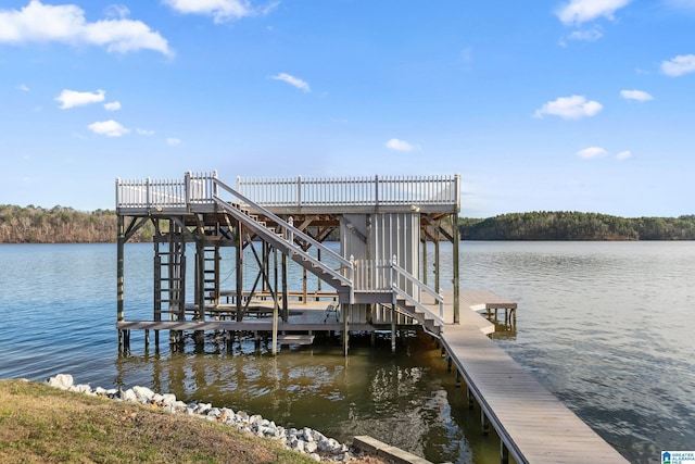 view of dock with a water view and boat lift