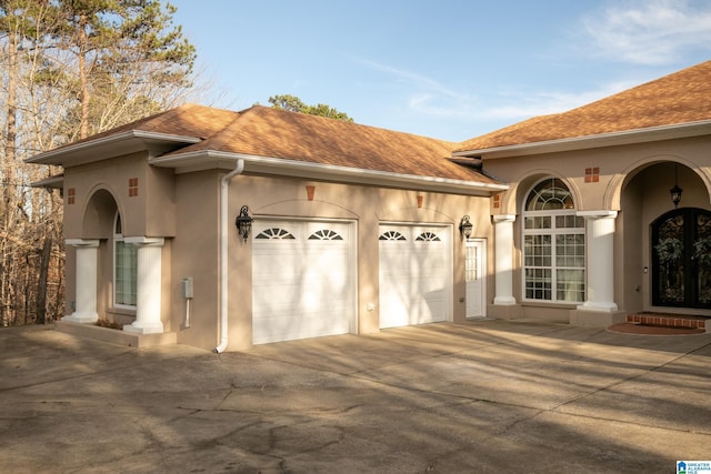 garage with driveway