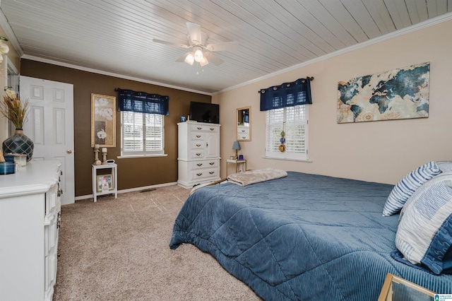 bedroom featuring light carpet, multiple windows, baseboards, and ornamental molding