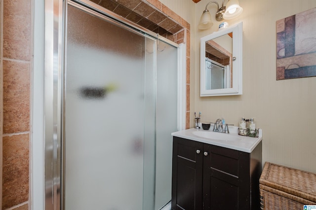 bathroom featuring vanity and a stall shower