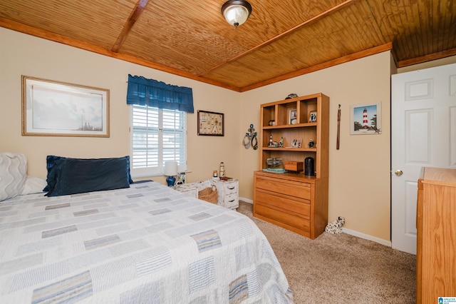 carpeted bedroom featuring wood ceiling, baseboards, and ornamental molding