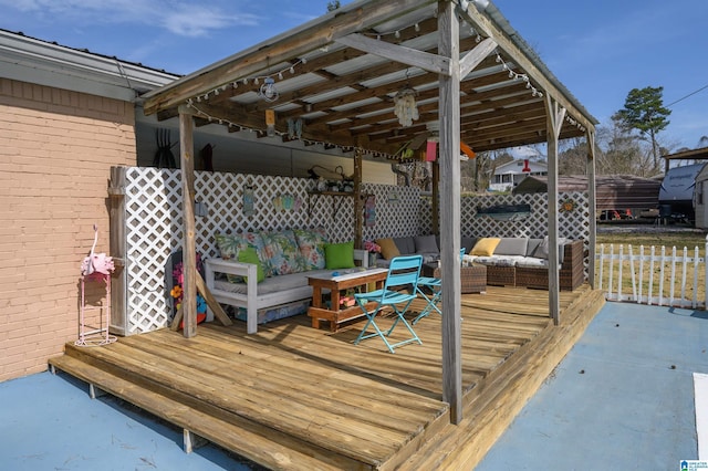 deck with an outdoor hangout area