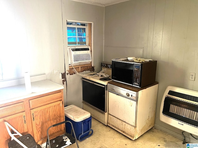 kitchen with white electric range, heating unit, cooling unit, black microwave, and light countertops