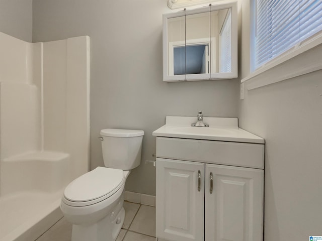 full bath featuring baseboards, walk in shower, toilet, tile patterned floors, and vanity