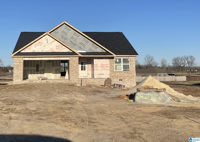 exterior space with brick siding