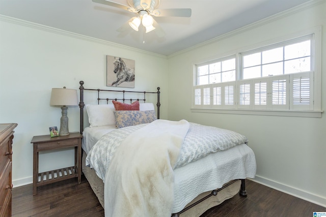 bedroom with baseboards, wood finished floors, and ornamental molding