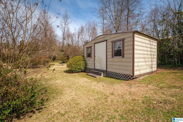 view of outdoor structure featuring an outbuilding and entry steps