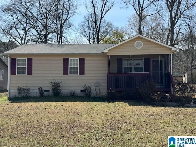 ranch-style house with crawl space, a front yard, and a sunroom