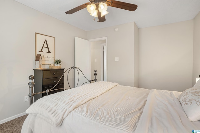 bedroom featuring baseboards, carpet, and a ceiling fan