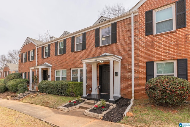 view of front of home with brick siding