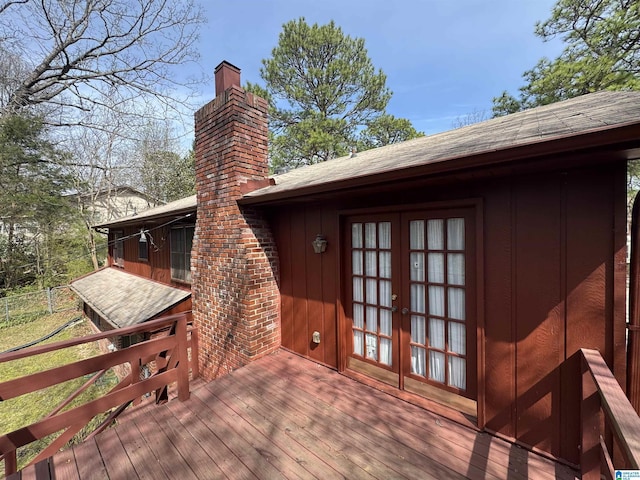 wooden deck with french doors and fence