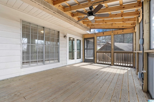 exterior space with ceiling fan