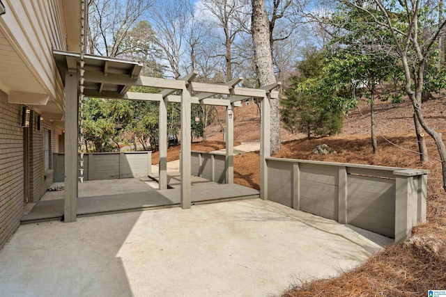 view of patio featuring a pergola