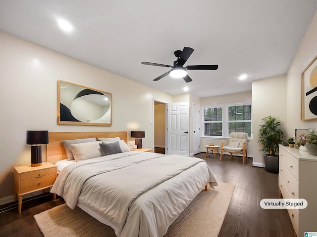 bedroom with baseboards, a ceiling fan, and dark wood-style flooring