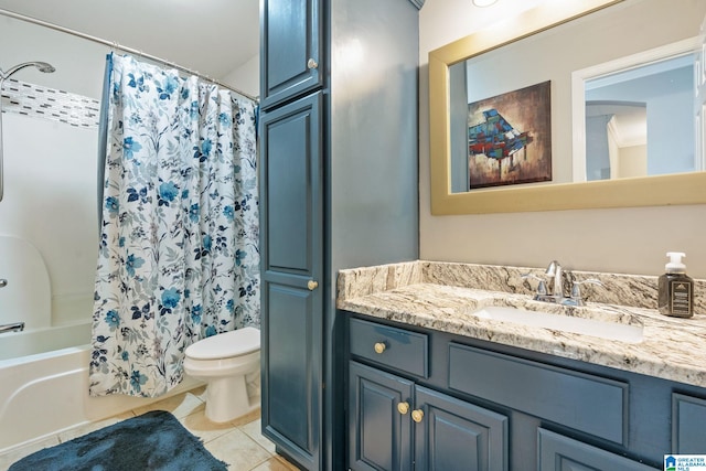 full bath with tile patterned flooring, shower / tub combo, toilet, and vanity