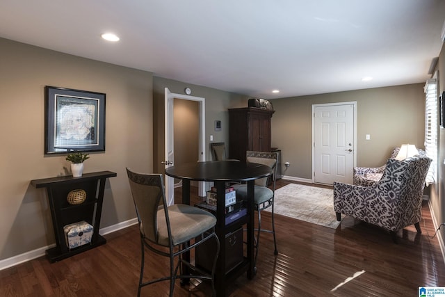 dining area with recessed lighting, dark wood-type flooring, and baseboards