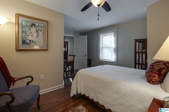 bedroom with baseboards, ceiling fan, and dark wood-style flooring