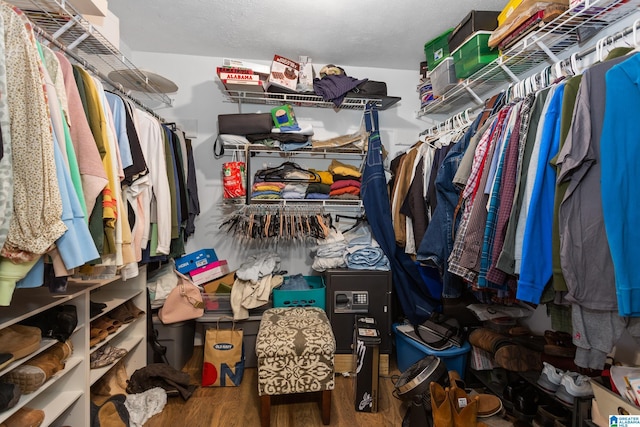 spacious closet with wood finished floors