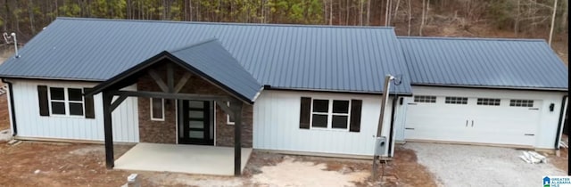 view of front facade with metal roof